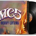 Vinyl record with colorful cover featuring 'MCS' and 'Heavy Lifting'